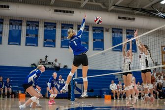 Auburndale volleyball players in action