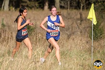 Lodi's Aubrey Schoenemann leads Aquinas' Sanjana Musafir during the WIAA Division 2 sectional race at Wyona Park