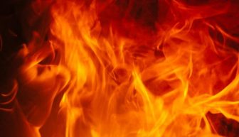 Eau Claire garage and house fire causes $300,000 in damage, sends one resident to hospital
