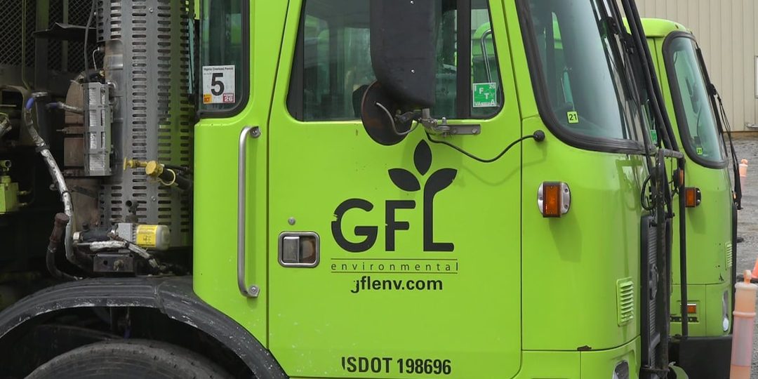 A bright green GFL Environmental truck