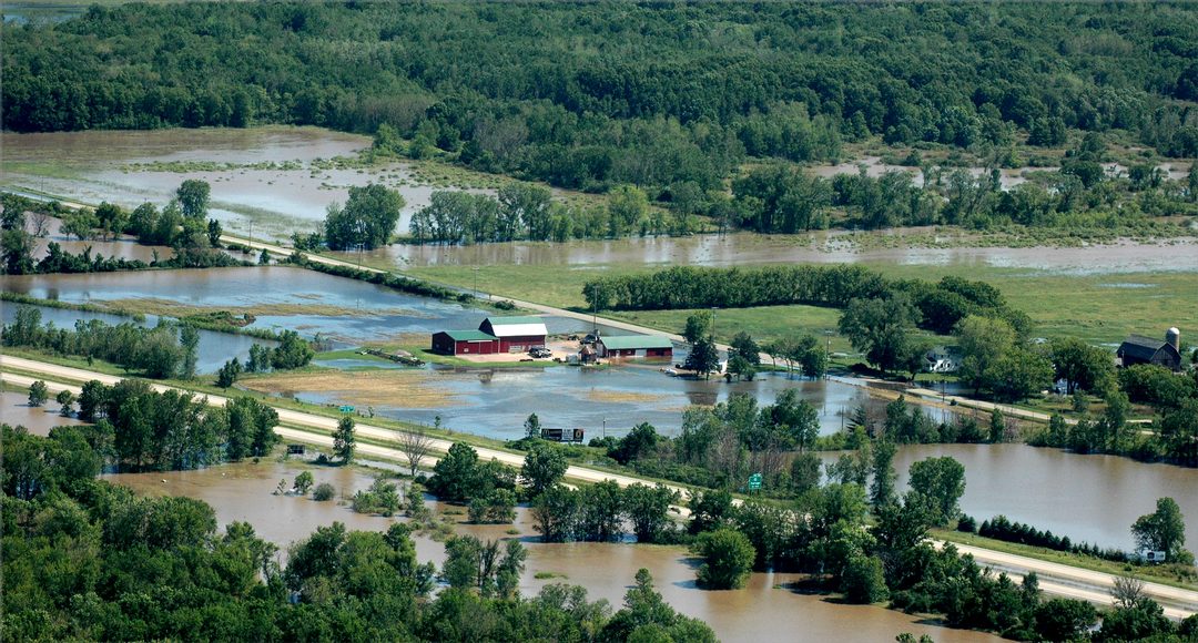 Floodwater receding from a Wisconsin farm field