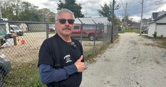 Duane O'Keefe standing beside the graded alley near 39th Street and 14th Avenue in Kenosha