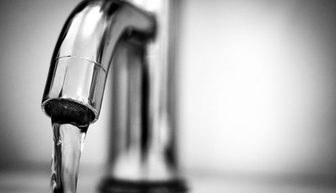 Water running from a household faucet