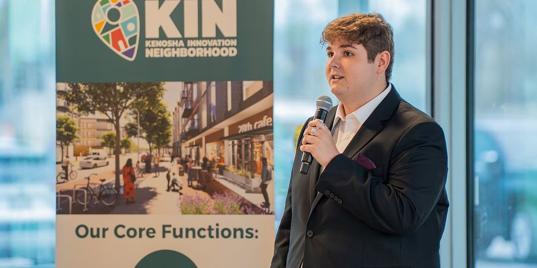 A student speaking during a pitch competition at the Kenosha Innovation Center