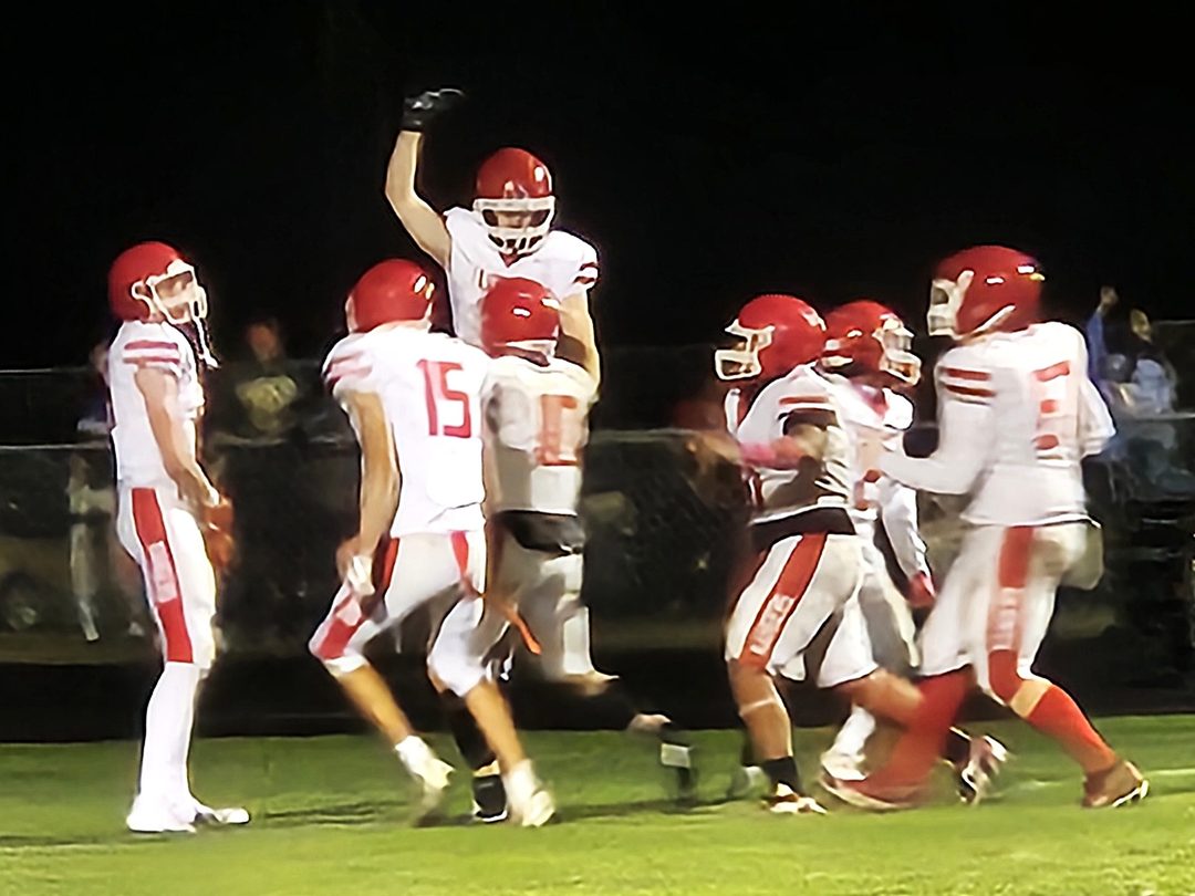 The Logan football team after its WIAA Division 3 second-round playoff win over Mount Horeb/Barneveld