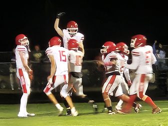 The Logan football team after its WIAA Division 3 second-round playoff win over Mount Horeb/Barneveld