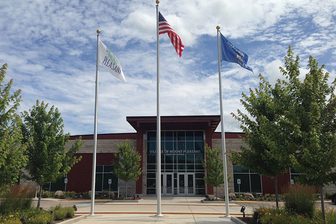 Village of Mount Pleasant Village Hall with flags in front