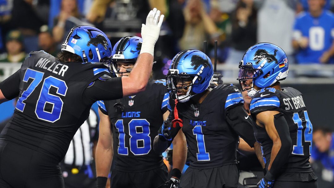 Detroit Lions players celebrating during their game against the Green Bay Packers
