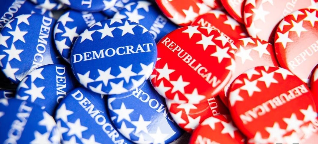 Blue Democrat and red Republican campaign buttons