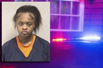 Booking photo of Jaraniyah J. Johnson beside police lights
