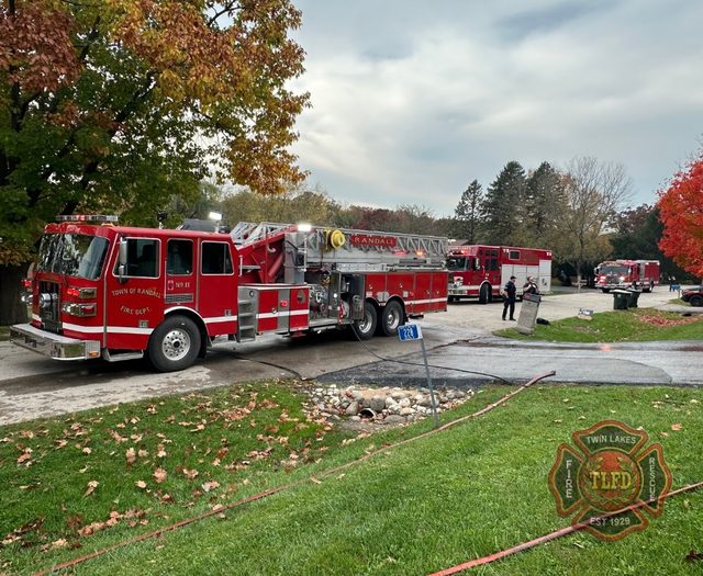 Twin Lakes firefighters at a house fire on Hawthorn Drive