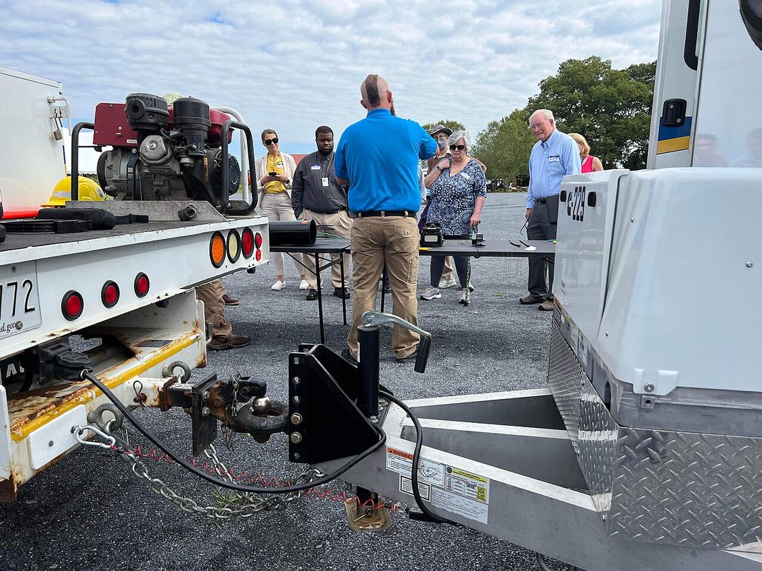 Attendees at a USDA Rural Development fiber optic cable work demonstration