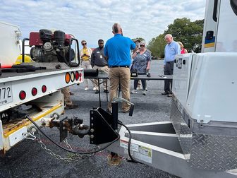 Attendees at a USDA Rural Development fiber optic cable work demonstration