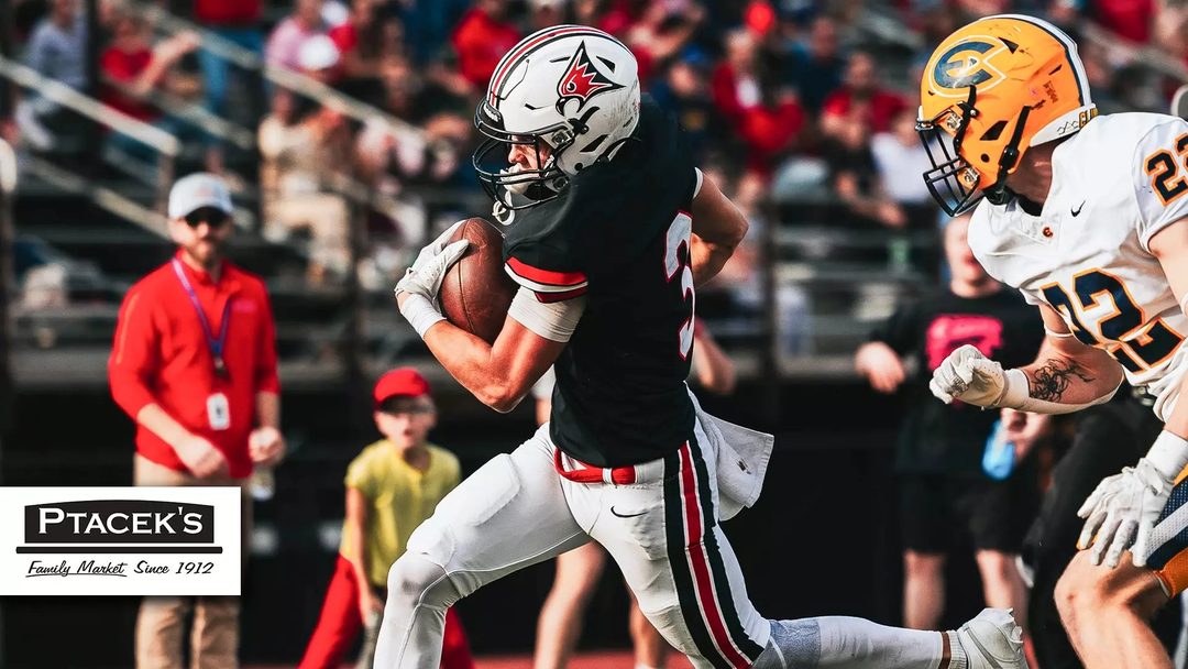 A UW-River Falls player runs with the ball against UW-Eau Claire at Ramer Field