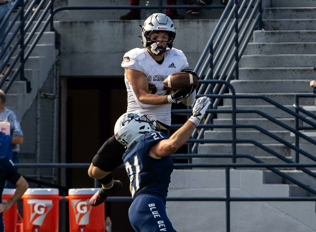 A UW-La Crosse player making a catch against UW-Stout