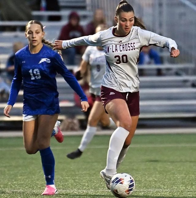 Macy Evans dribbling the ball for UW-La Crosse