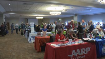 Veterans and families visiting resource tables at the Veterans Expo in Onalaska
