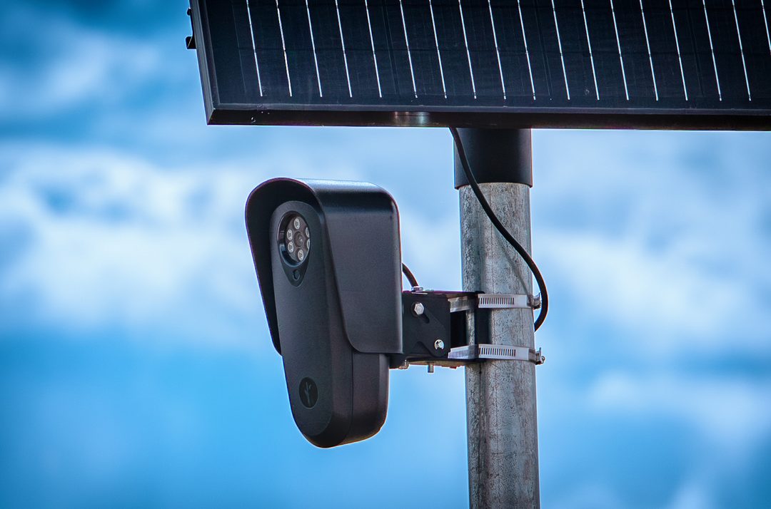 A Flock Safety automated license plate reader camera mounted on a pole