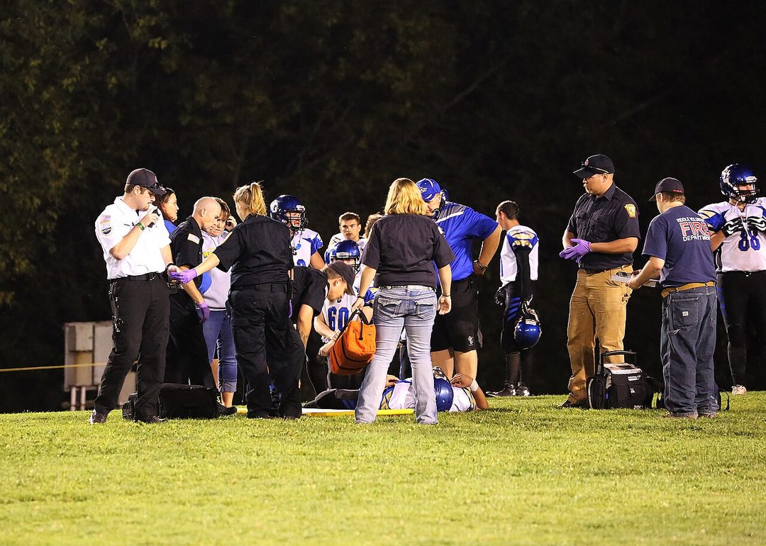 A high school football game under the lights