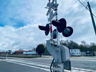 Railroad crossing signals at a street crossing